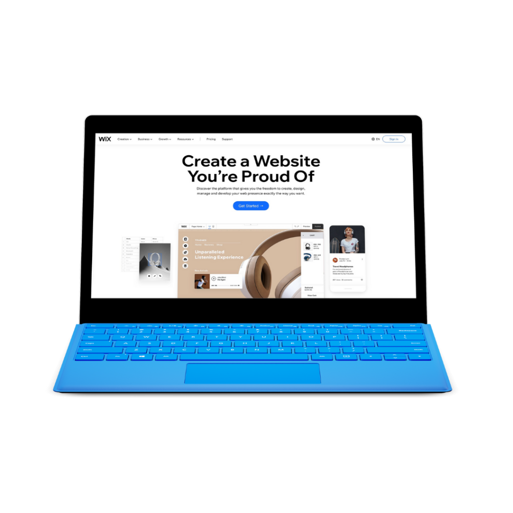 A laptop with the Wix hompage on the screen